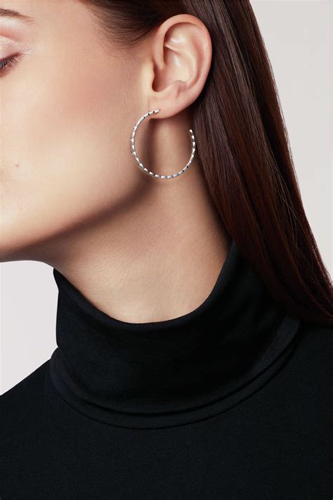 chanel coco crush hoop earrings.